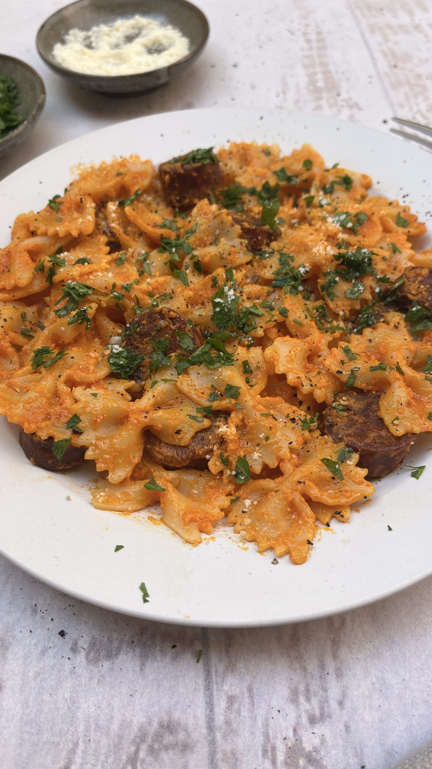 Farfalle pasta tossed with smooth blended butternut squash with fried chorizo sausage and topped with fresh chopped parslet