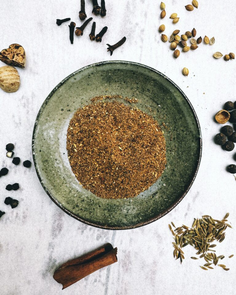 Baharat whole and ground mix, also known as seven spice