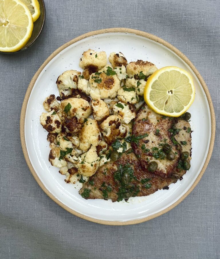 veal piccata - lightly breaded fried veal escalops with lemon, parsley and capers served alongside fried cauliflower.