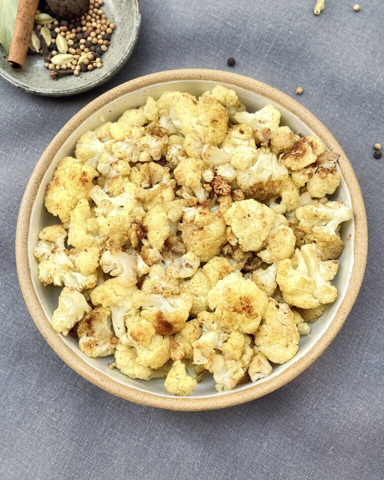 a plate with roasted cauliflower spiced with garam masala