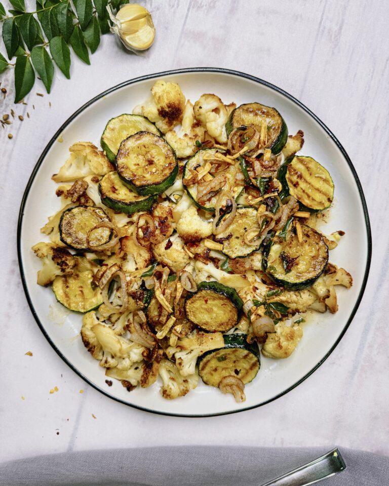 fried cauliflower and zucchini with tempered spices and aromatics