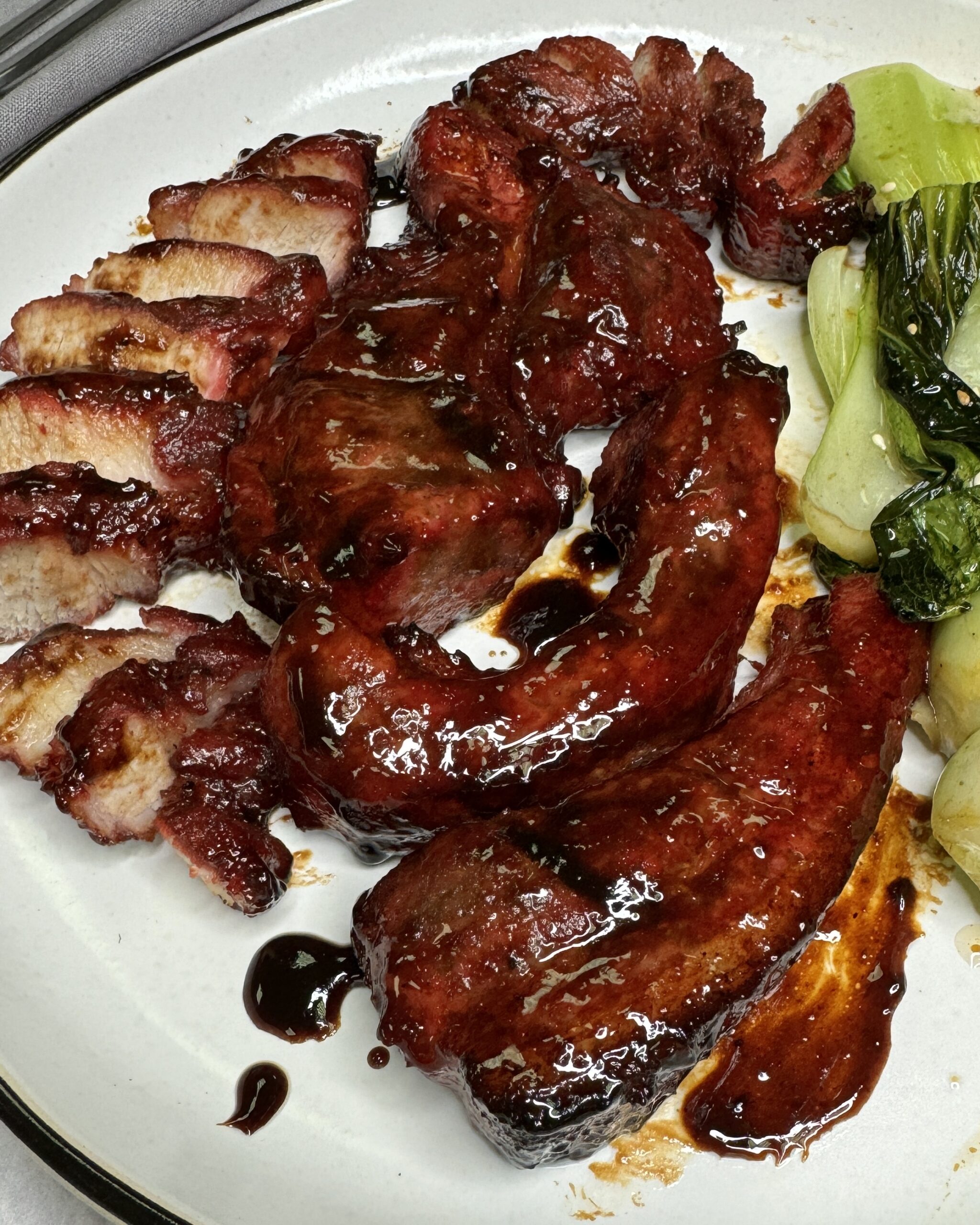 char siu, chinese bbq pork, strips of pork belly in a sticky brown-red glaze made with char siu sauce