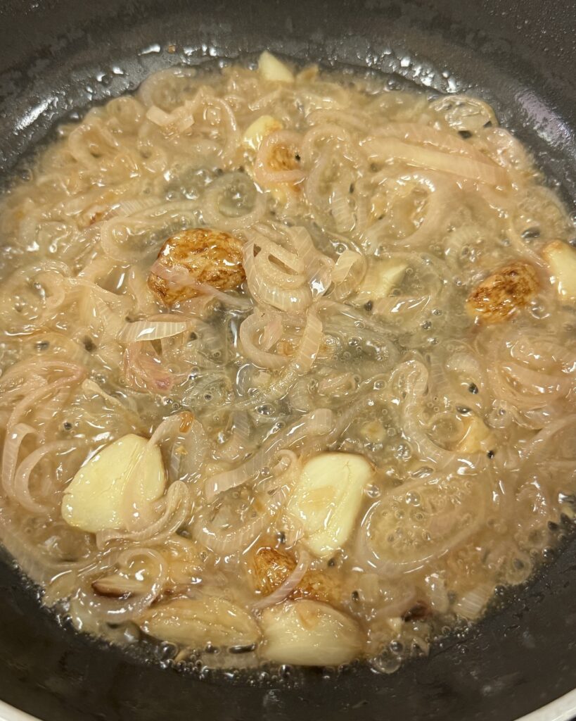 shallots and garlic simmering in white wine