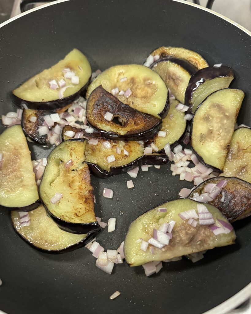 fried semi circles of eggplant