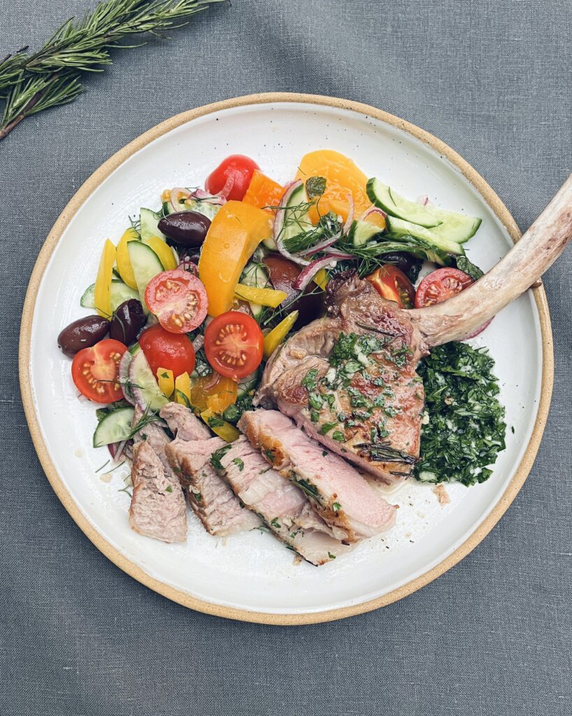 Bone in veal shank with mixed vegetables salad and gremolata