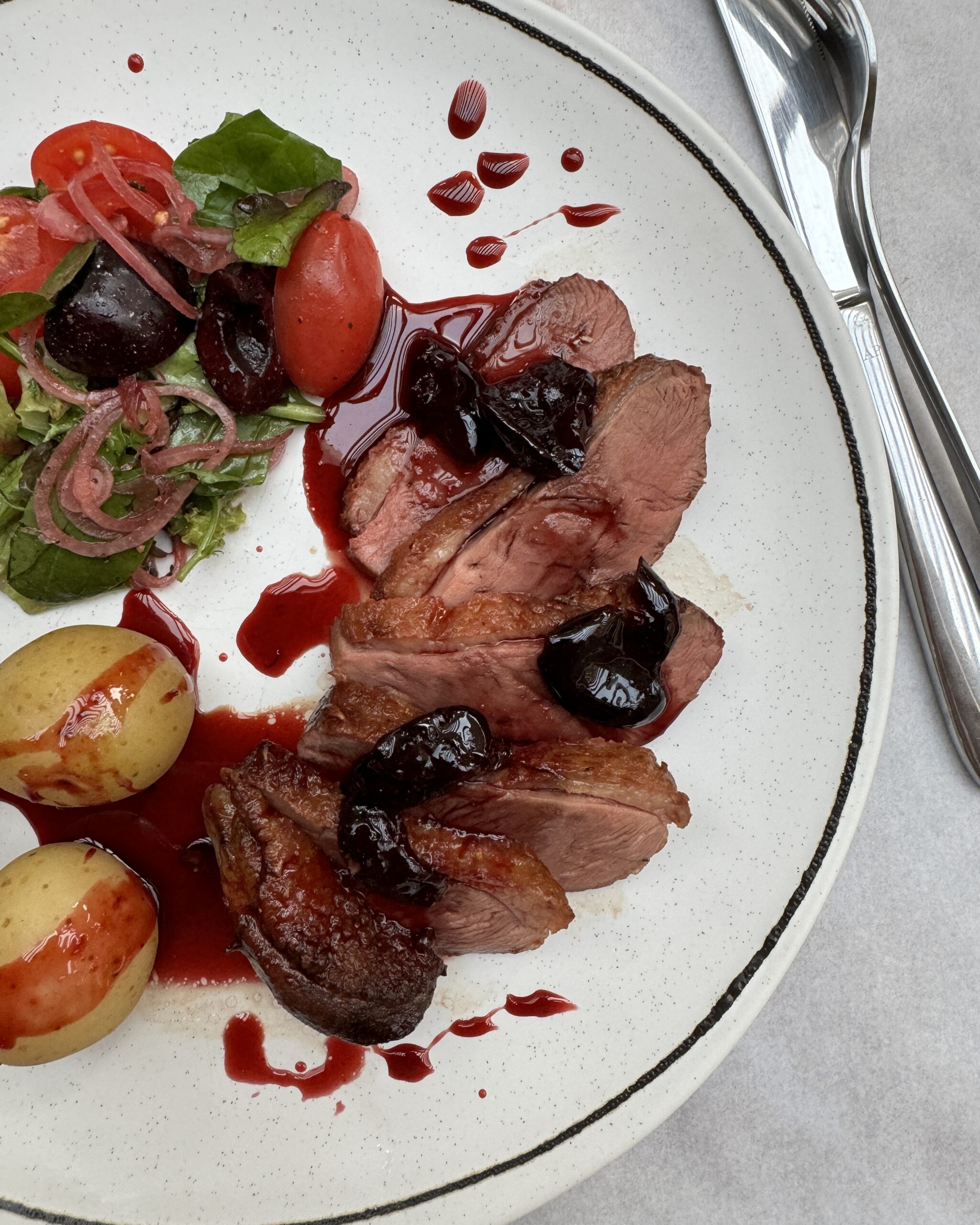 Roasted duck breast with cherry sauce