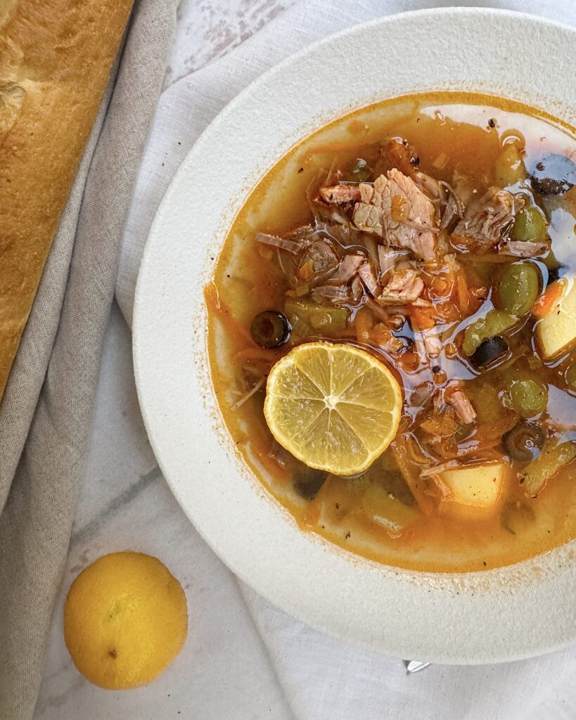 A bowl of meat solyanka soup